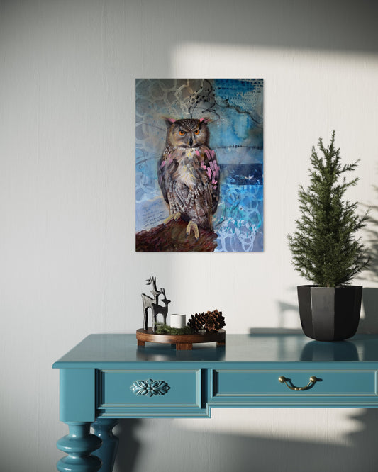 Contemporary owl wall art print displayed on a modern shelf with plant pot and decor, featuring a detailed owl with orange eyes in a textured blue background.