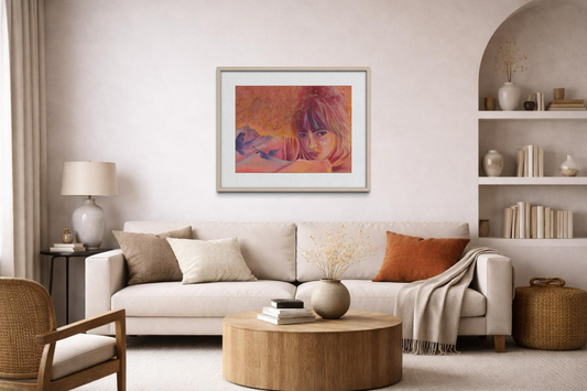 Modern living room with a beige sofa, round wooden coffee table, and colorful abstract painting on the wall.