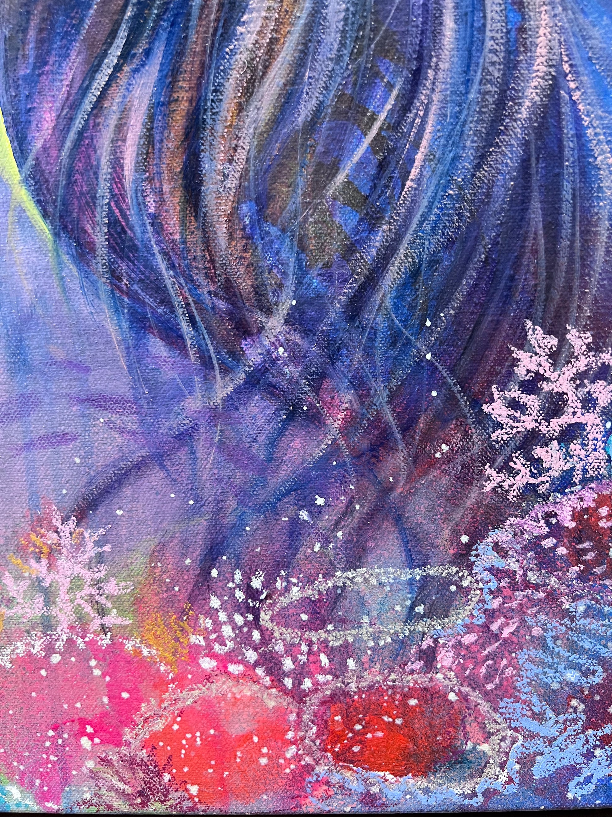 Detail photo of a colourful and modern portrait artwork with swirling blue and purple patterns and red coral.