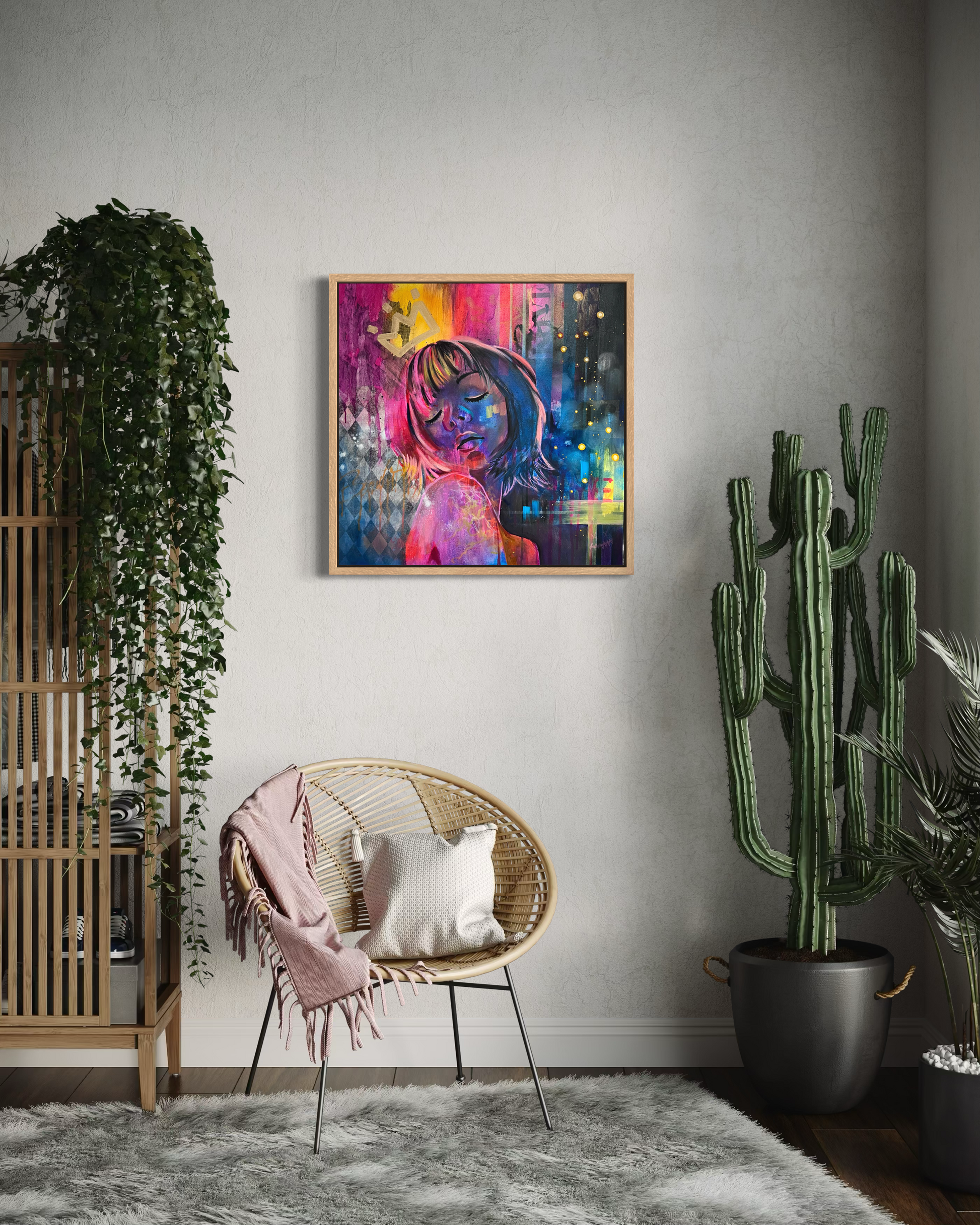 Contemporary portrait painting inspired by Tokyo with vibrant pink, blue and yellow tones on a wall above a wicker chair with a blanket and pillows, surrounded by plants.